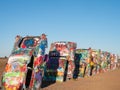 Row of Graffiti-Covered Cadillacs at the Public Art Installation called Cadillac Ranch in Amarillo, Texas Royalty Free Stock Photo