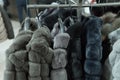 Row of gray fur coats on the rack, clothing shop Royalty Free Stock Photo