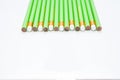 Row of Green Pencils on white