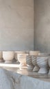 A row of hexagonal marble vessels each with a unique swirl pattern adding a touch of sophistication to a minimalist