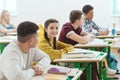 row of high school students sitting in class