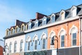 Row of historic buildings with dormer windows on a clear autumn day Royalty Free Stock Photo