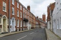 Row of historic terrace houses and market clock on St John\'s Hill Shrewsbury