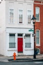 Row house along Portland Street in Ridgely`s Delight, Baltimore, Maryland