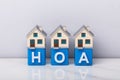 Row Of House Models On HOA Cubic Blocks Royalty Free Stock Photo