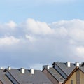 Row house roofs, large detailed panoramic roofscape, condo rowhouse rooftop detail panorama, multiple condos, bright blue summer