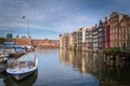 Row houses by the canal in Amsterdam, Netherlands Royalty Free Stock Photo