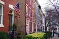 Row houses with flags flying