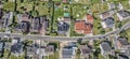 row of houses on a street in Germany, detached houses with gardens, aerial photo Royalty Free Stock Photo