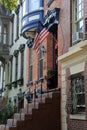 Row houses with welcoming potted plants at the front door Royalty Free Stock Photo