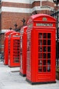 Row of iconic London red phone cabins