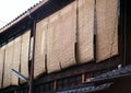 Row of Japanese old traditional window wooden curtains Royalty Free Stock Photo