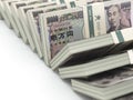 Row of japanese yen pack money on white background. 3d Royalty Free Stock Photo