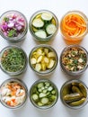 A row of jars with pickles in them Royalty Free Stock Photo