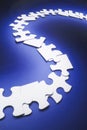 Row of Jigsaw Puzzle Pieces Royalty Free Stock Photo