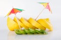 Row of juicy yellow lemon sliced wheels with straw Royalty Free Stock Photo