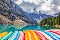 Row of Kayaks on Moraine Lake in the Canadian Rockies Royalty Free Stock Photo