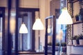 A row of lamps in the interior of the restaurant. Modern lighting fixtures as restaurant interior design Royalty Free Stock Photo
