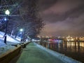 A row of lanterns on the snowy embankment. Embankment of Moscow river in the wintertime. Moscow, Russia