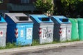 Italy , Rome , 17 March 2020 : Row of large green wheelie bins for rubbish, recycling and garden waste