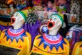 A row of laughing clown faces