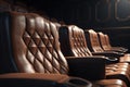 Row of leather seats in cinema hall Royalty Free Stock Photo
