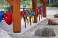 A row of lifejackets hanging on a rail