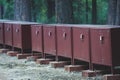 Row line of bear proof food metal storage lockers installed near camping campground in Yosemite National Park, California, United