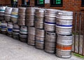 A Row Or Line Of empty Used Beer Barrels Or Kegs With No People