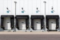 Row of loading docks with shutter doors at an industrial warehouse Royalty Free Stock Photo