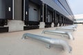 Row of loading docks at a warehouse under the clear blue sky Royalty Free Stock Photo