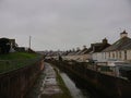 A row of local vintage historical cottage houses by the river water canal