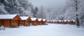 Row of Log Cabins in Snow Royalty Free Stock Photo