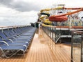 Lounge chairs lined up a cruise ship deck Royalty Free Stock Photo