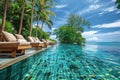 Row of Lounge Chairs Next to Swimming Pool Royalty Free Stock Photo