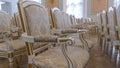 Row of luxury vintage chairs. Chairs for seating the audience at the conference or concert. Theatrical armchairs. Royalty Free Stock Photo