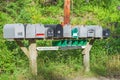 Row of mailboxes at the roadside Royalty Free Stock Photo