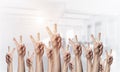 Row of man hands showing victory gesture Royalty Free Stock Photo