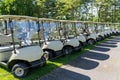 Row of many golf carts Royalty Free Stock Photo