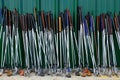 Row of Many Old Used Golf Clubs for Sport Royalty Free Stock Photo