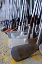 Row of Many Old Used Golf Clubs for Sport Royalty Free Stock Photo