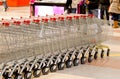 A row of many shopping carts from a supermarket Royalty Free Stock Photo