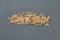 Row of many used matchsticks with burnt sulfur on dark concrete table on kitchen. Top view