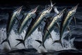 row of marlins leaping from the water in unison