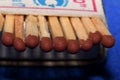 A row of matches with red sulphur heads Royalty Free Stock Photo