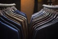 Rows of men`s suit jackets in suitshop Royalty Free Stock Photo