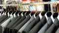 men's suits hanging in closet Royalty Free Stock Photo