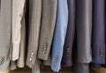 Row of men suit jackets on hangers Royalty Free Stock Photo