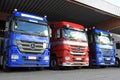 Row of Mercedes-Benz Actros Trucks in Carport