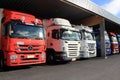 Row of Mercedes-Benz Actros Trucks in Carport